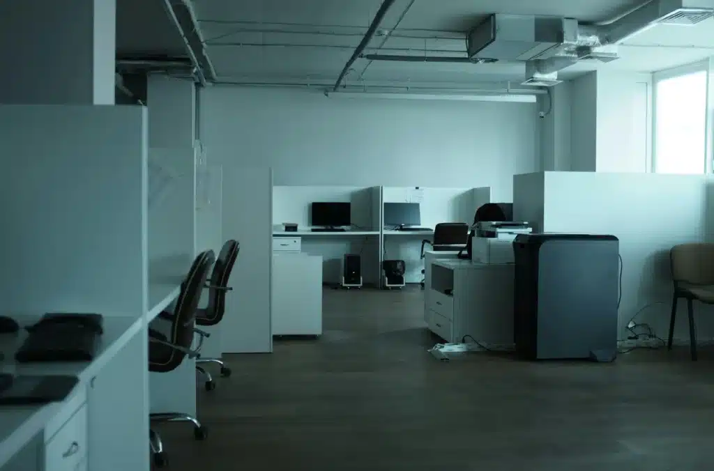 Empty office workspace symbolizing high employee turnover and low morale within a company