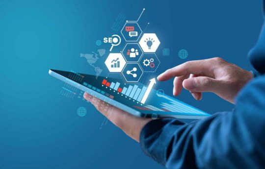 Businessman show growth graph of earning with digital marketing strategy.