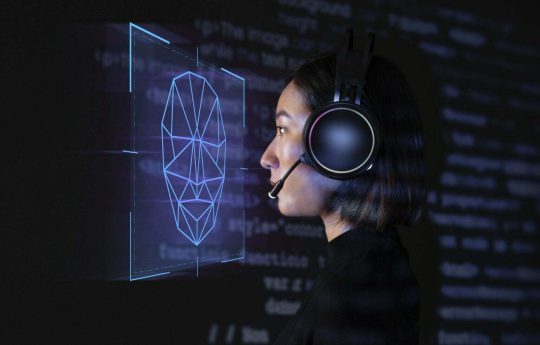 female-programmer-scanning-her-face-with-biometric-security-technology-virtual-screen-digital-remix-1536x1024